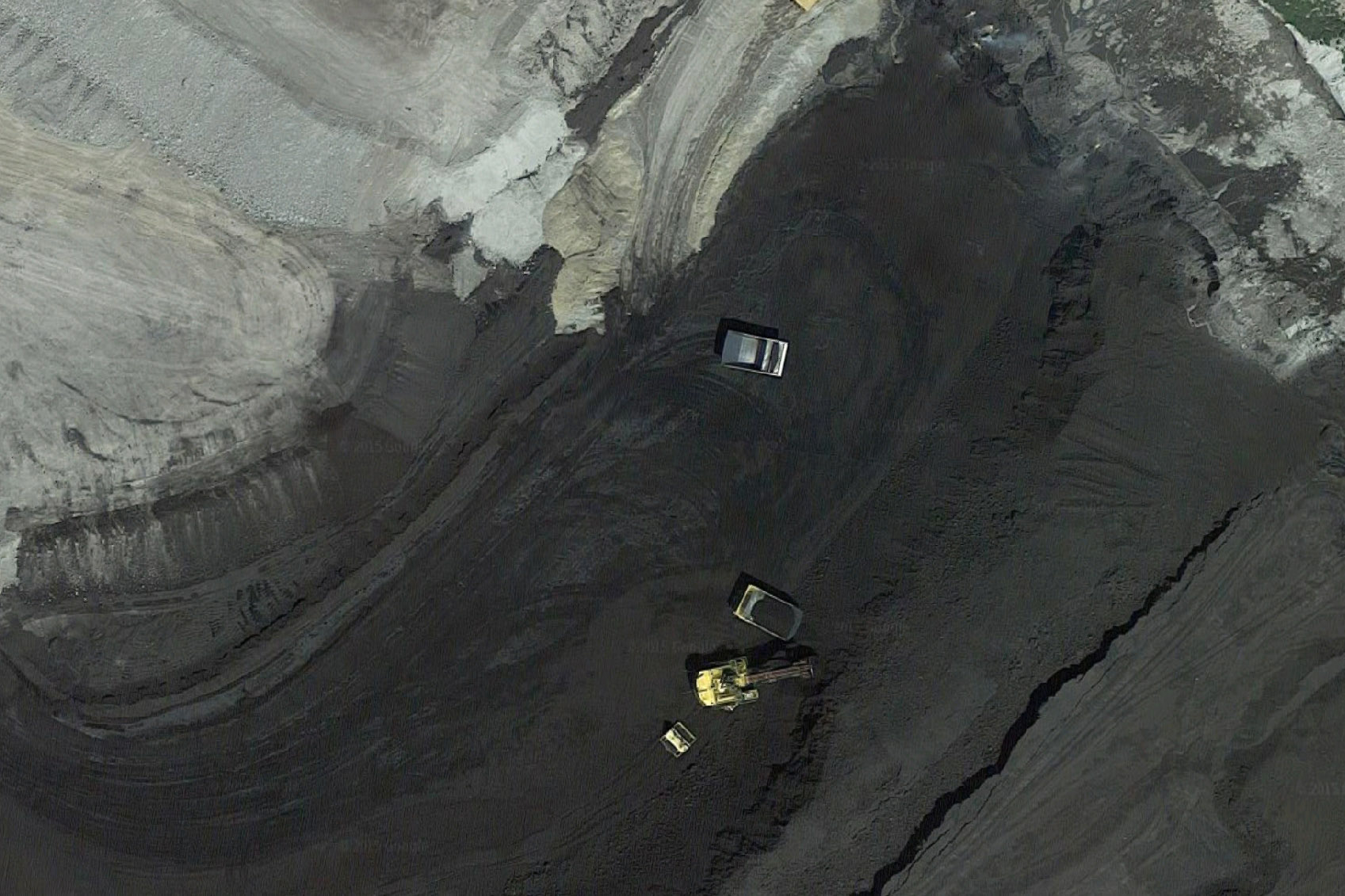 An aerial view of Wyoming's Eagle Butte Mine, owned by bankrupt Alpha Natural Resources. Regulators estimate it would cost over $400 million to restore the land that Alpha has mined in Wyoming. Photo: Google Earth