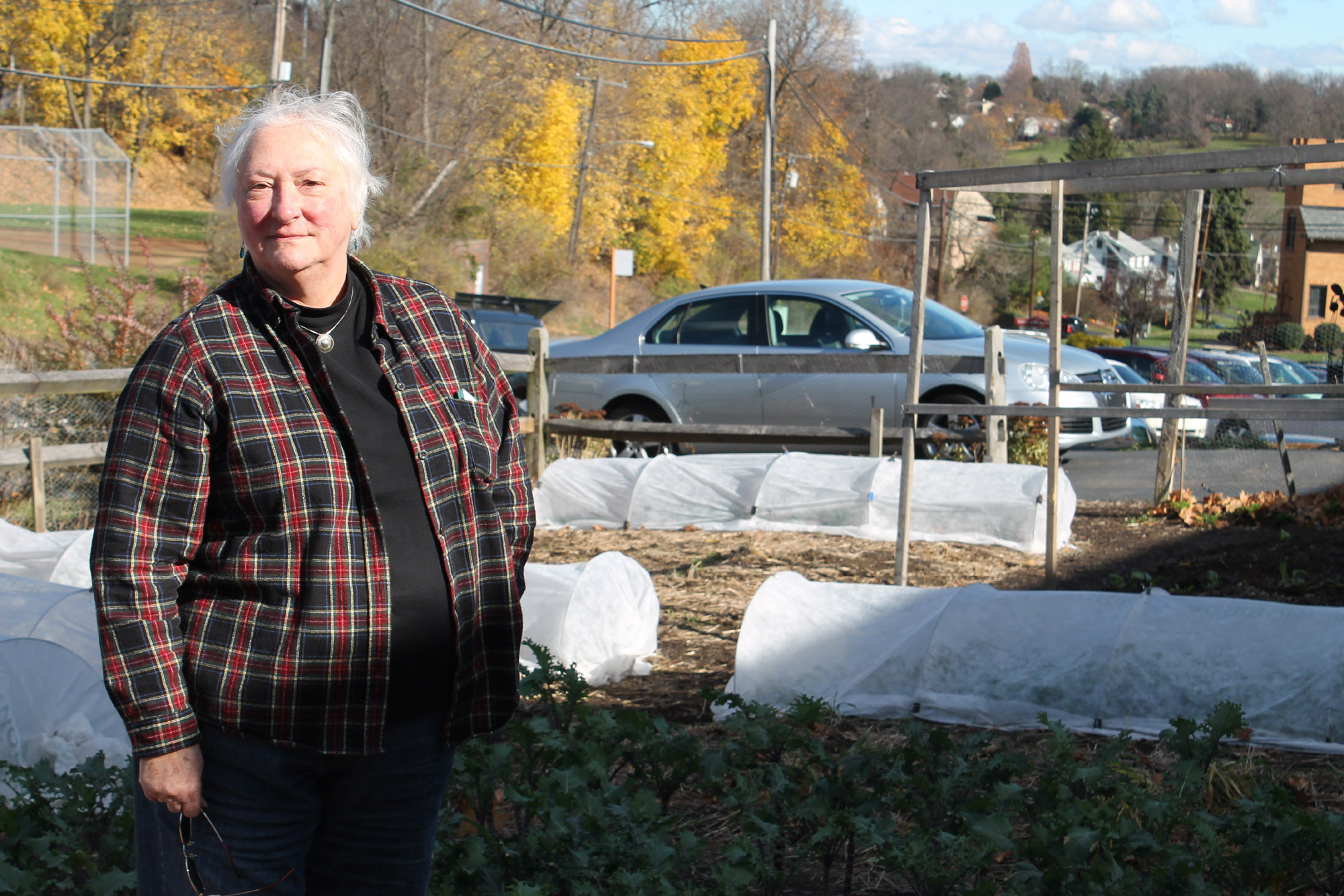 Pat Eagon stands outside the garden near the South Hills Interfaith Ministries food pantry in Pittsburgh. Last year, Eagon helped grow 15,000 pounds of fresh produce for the pantry. Photo: Julie Grant