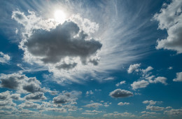 A blue sky with white clouds