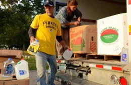 volunteers prepare for a weekly water drive