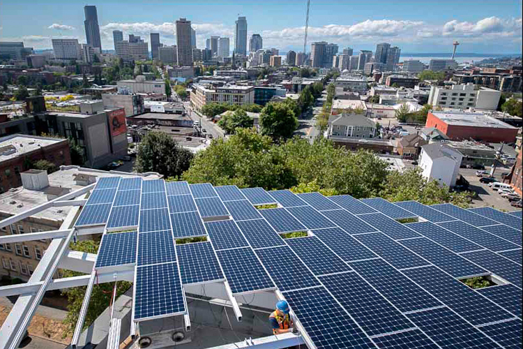 solar panels in the forefront of a city in the background