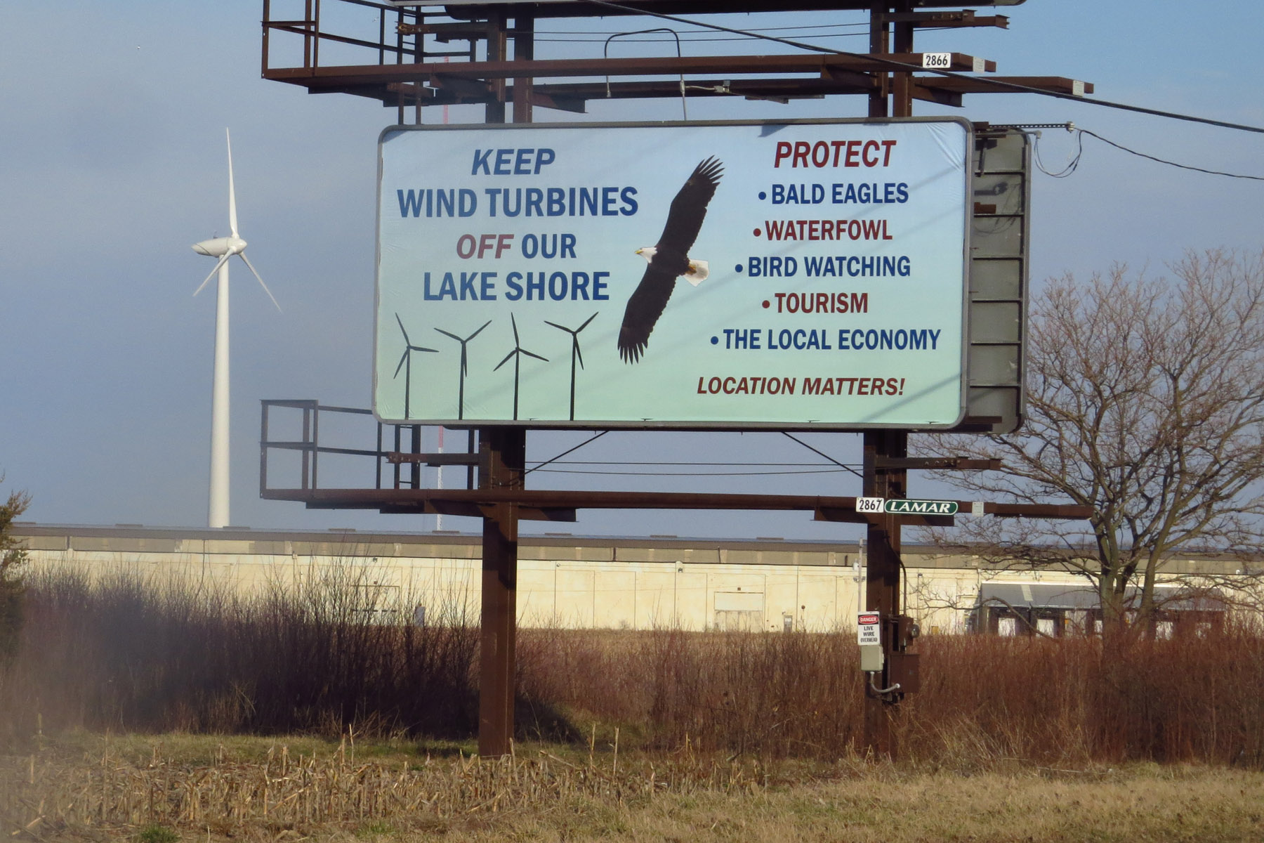 Billboard against Wind energy.