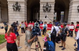 People in front of the cameras at the EPA building