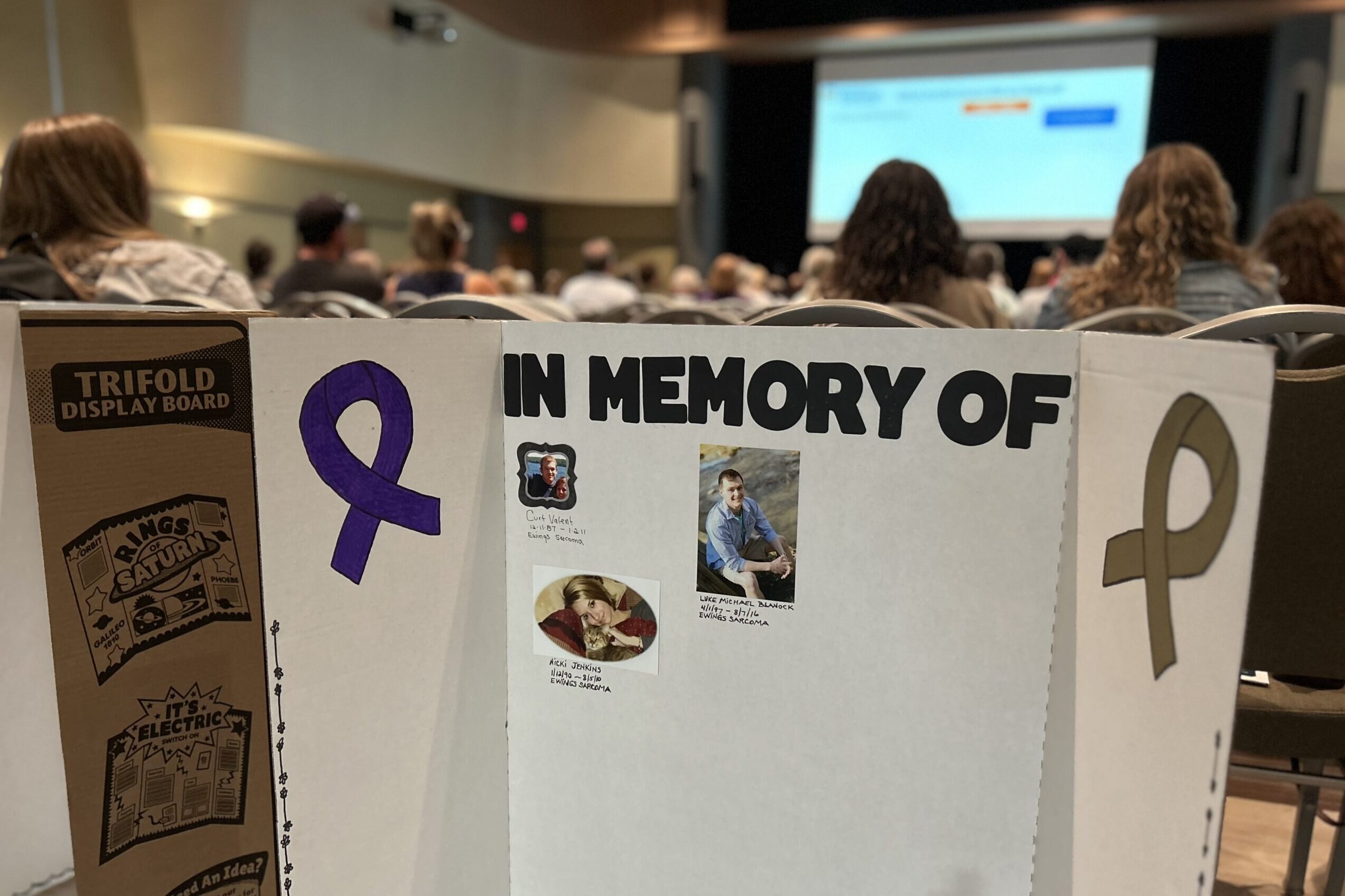 A tabletop display in the back of an auditorium