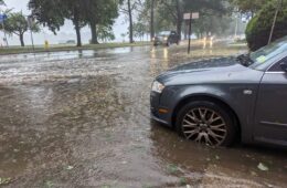 car on flooded street