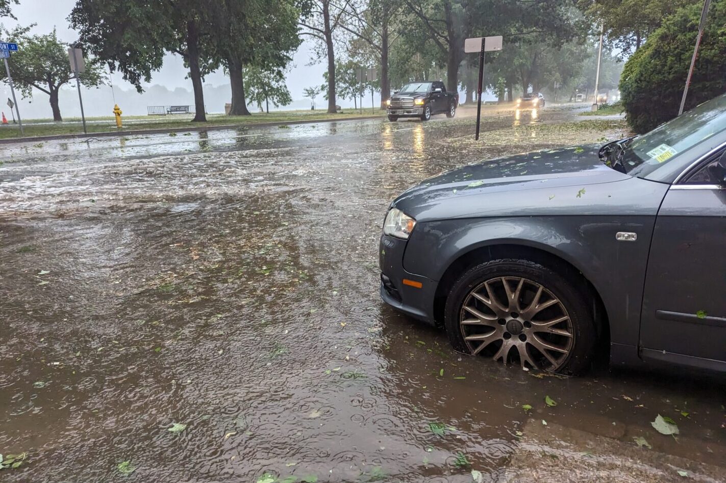 car on flooded street