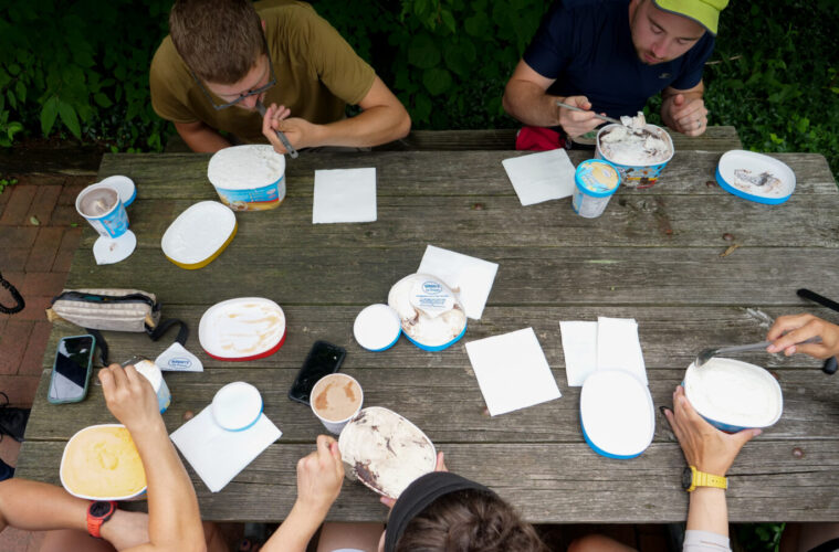 A table of people eating ice cream