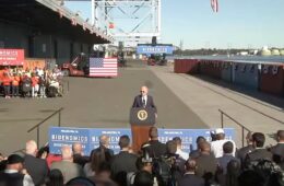 President Biden at a podium in front of reporters at Tioga Marine Terminal in the Port of Philadelphia