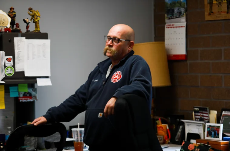 Keith Drabick stands in the firehouse