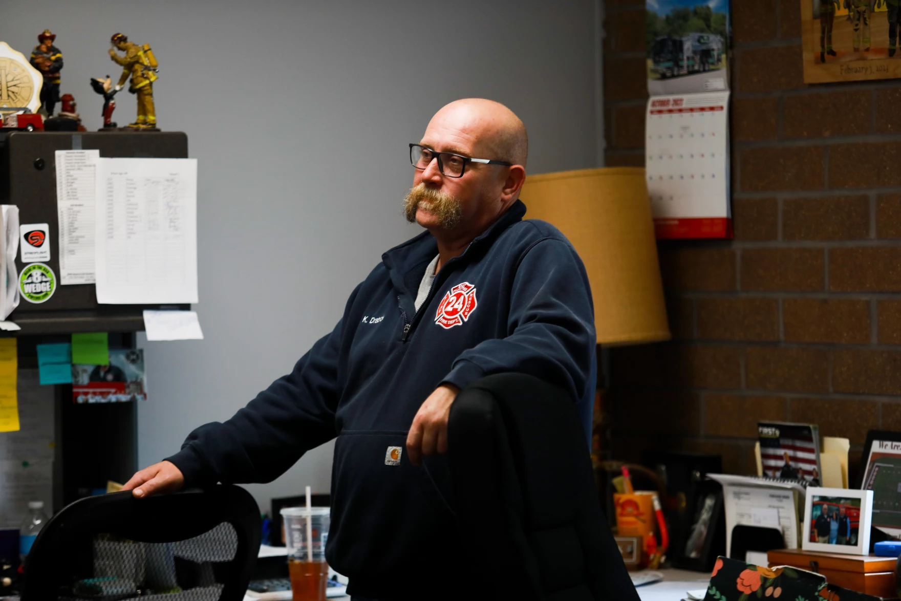 Keith Drabick stands in the firehouse