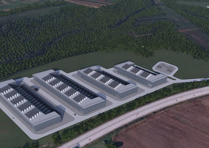 An image of what a data center will look like - rows of buildings surrounded by woods